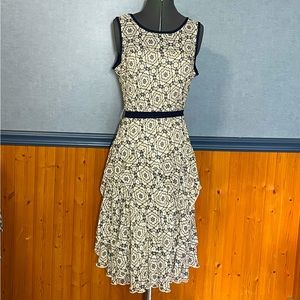 Robbie Bee sleeveless dress with cascading ruffles